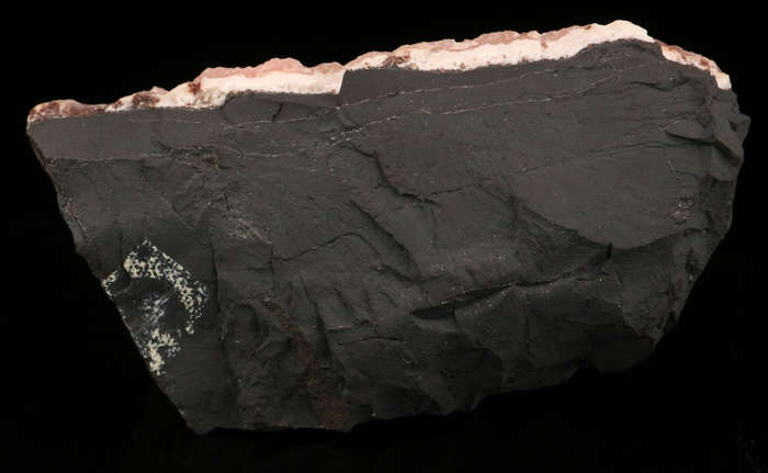 Rhodochrosite on Matrix, N'Chwaning II Mine, Kalahari Manganese Field, Northern Cape, South Africa.