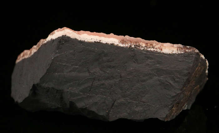 Rhodochrosite on Matrix, N'Chwaning II Mine, Kalahari Manganese Field, Northern Cape, South Africa.