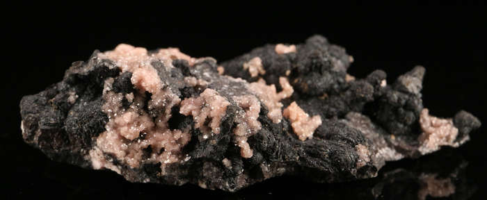 Rhodochrosite on Matrix,"N'Chwaning II Mine, Kalahari Manganese Field, Northern Cape, South Africa.