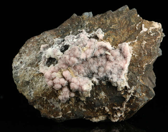 Rhodochrosite on Matrix,"N'Chwaning II Mine, Kalahari Manganese Field, Northern Cape, South Africa.