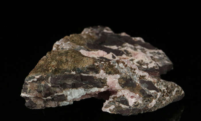 Rhodochrosite on Matrix,"N'Chwaning II Mine, Kalahari Manganese Field, Northern Cape, South Africa.