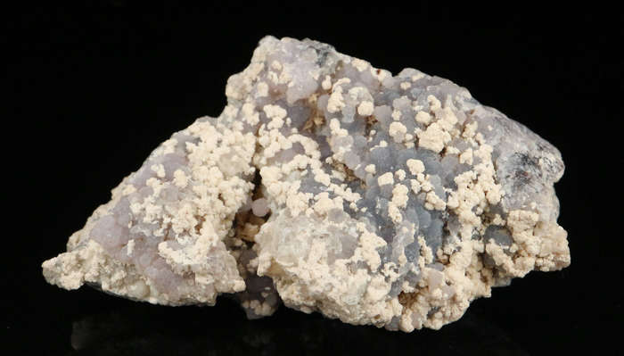 Calcite on Amethyst Quartz,"N'Chwaning III Mine, Kalahari Manganese Field, Northern Cape, South Afri