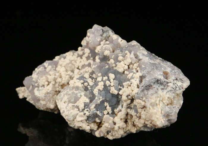 Calcite on Amethyst Quartz,"N'Chwaning III Mine, Kalahari Manganese Field, Northern Cape, South Afri
