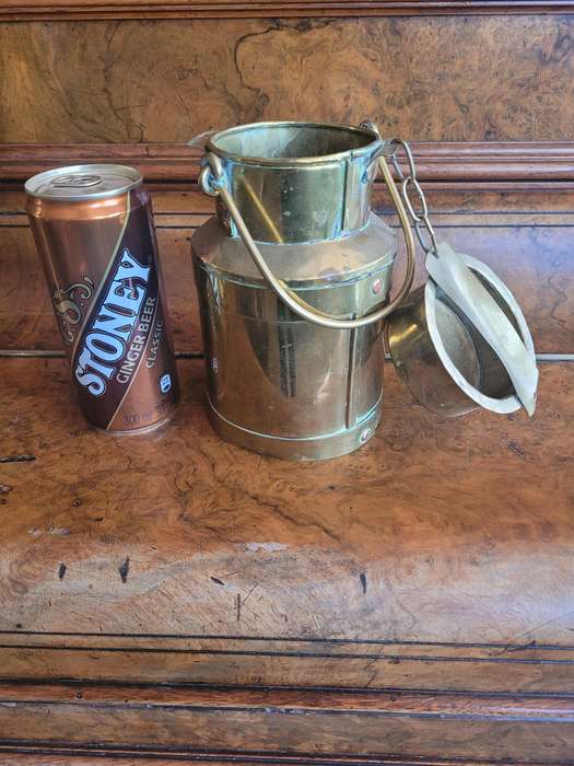 TWO VINTAGE BRASS MILK CANS.  FOR USE IN THE KITCHEN AND DISPAY AS CONVERSATION PIECES
