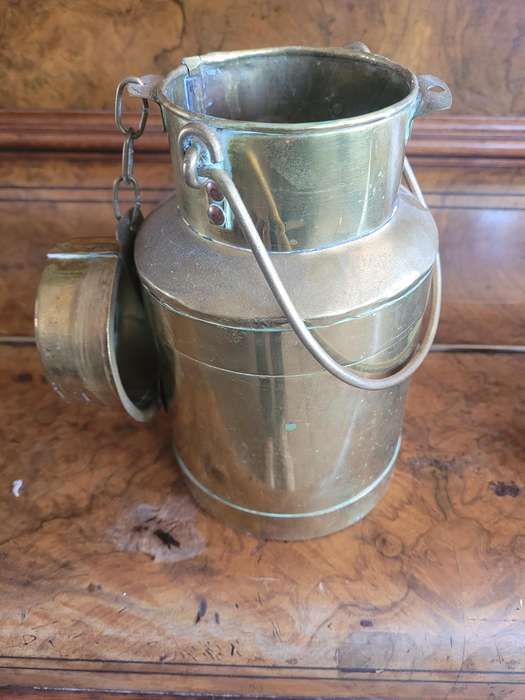 TWO VINTAGE BRASS MILK CANS.  FOR USE IN THE KITCHEN AND DISPAY AS CONVERSATION PIECES