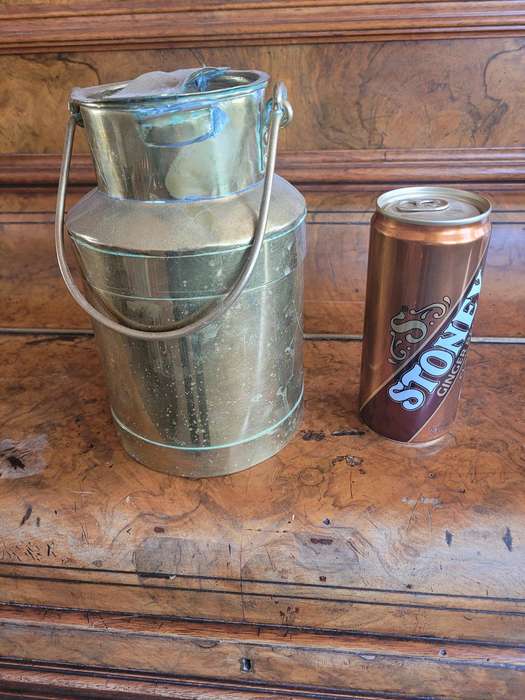 TWO VINTAGE BRASS MILK CANS.  FOR USE IN THE KITCHEN AND DISPAY AS CONVERSATION PIECES