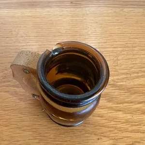 Vintage little glass tot measures with wooden handles