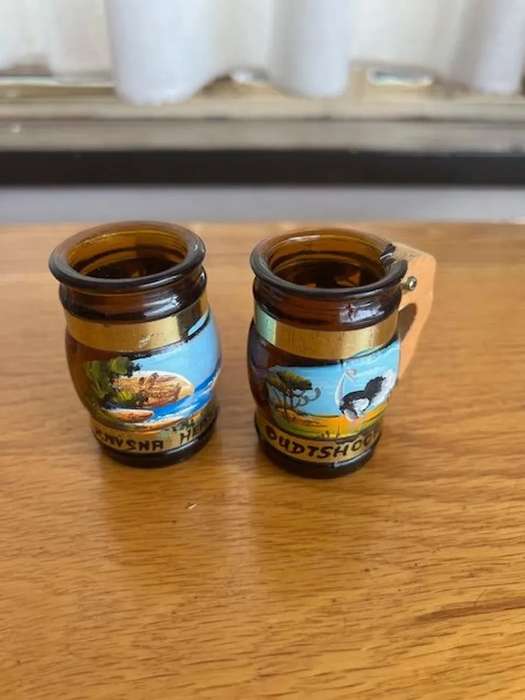 Vintage little glass tot measures with wooden handles