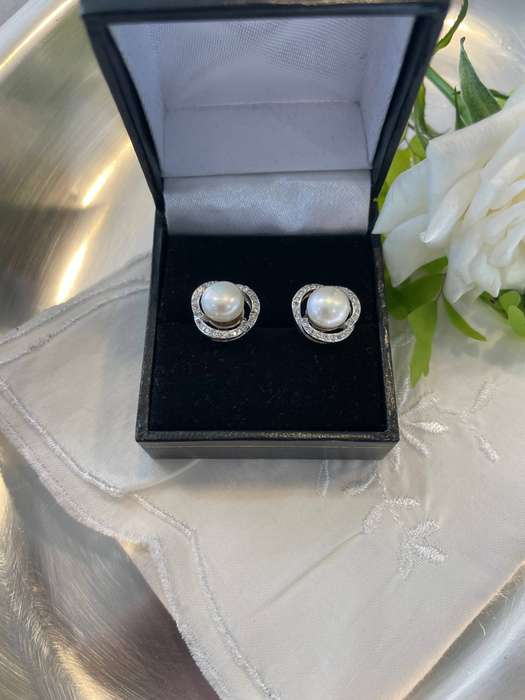 Dramatic gorgeously enhanced cultured freshwater pearls set in elegant 925 sterling silver.