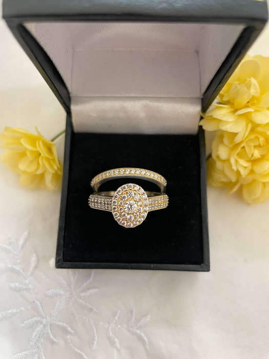 Woman Oval Halo 925 Sterling silver CZ Celebrity style Bridal ring set. Both rings included!
