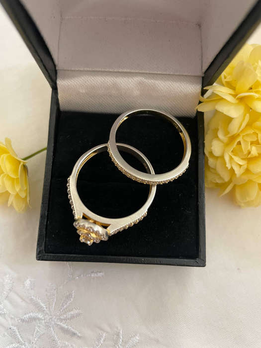 Woman Oval Halo 925 Sterling silver CZ Celebrity style Bridal ring set. Both rings included!