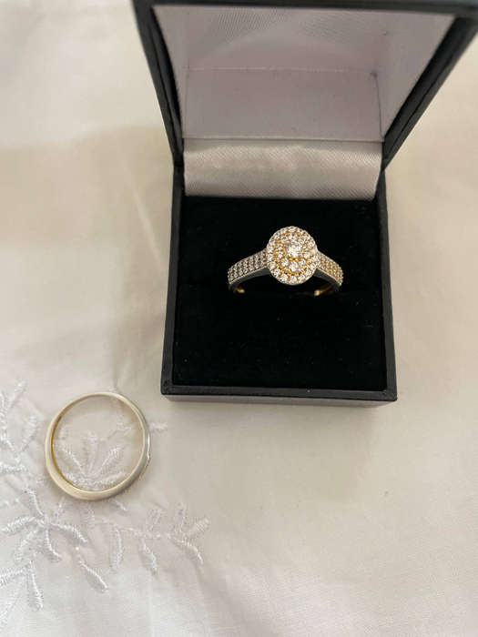 Woman Oval Halo 925 Sterling silver CZ Celebrity style Bridal ring set. Both rings included!
