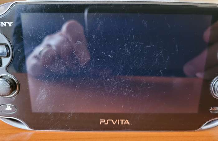 PS VIta PCH-1004 with OEM Charger and 8GB Memory Card
