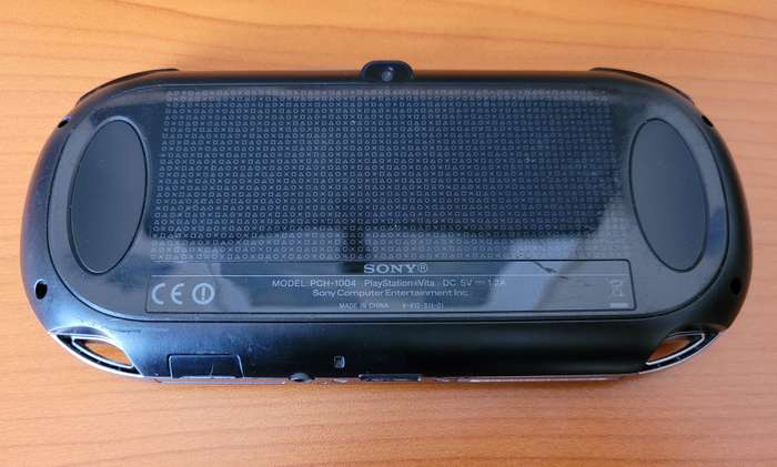 PS VIta PCH-1004 with OEM Charger and 8GB Memory Card