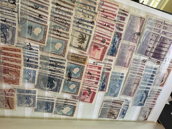 Malaysia,Switzerland ,Morocco, Kenya,Rwanda, Volta,Argentina Stamps in album