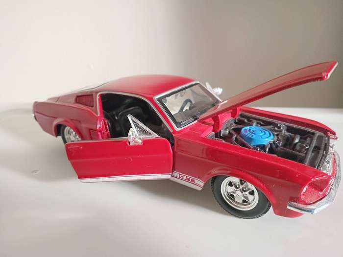 3 x vw beetle 1:32 scale diecast cars plus 1 x 1:24 scale Ford Mustang GT 1967 diecast car