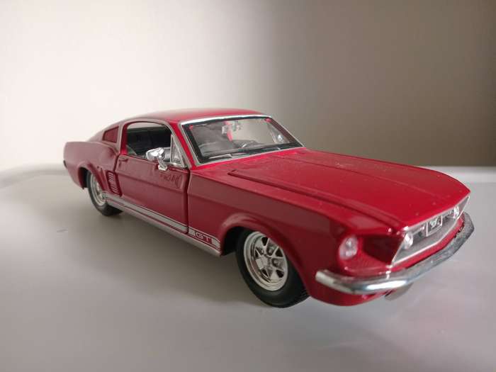 3 x vw beetle 1:32 scale diecast cars plus 1 x 1:24 scale Ford Mustang GT 1967 diecast car