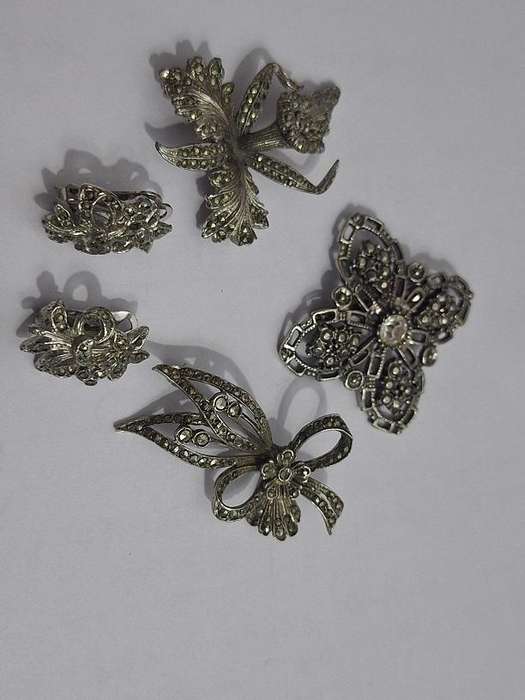3 x Brooches and 1 pair clip on earrings