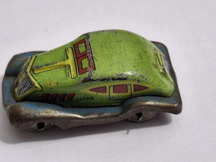 Vintage miniature tin toy car circa 1940s