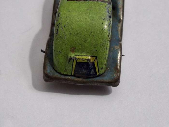 Vintage miniature tin toy car circa 1940s