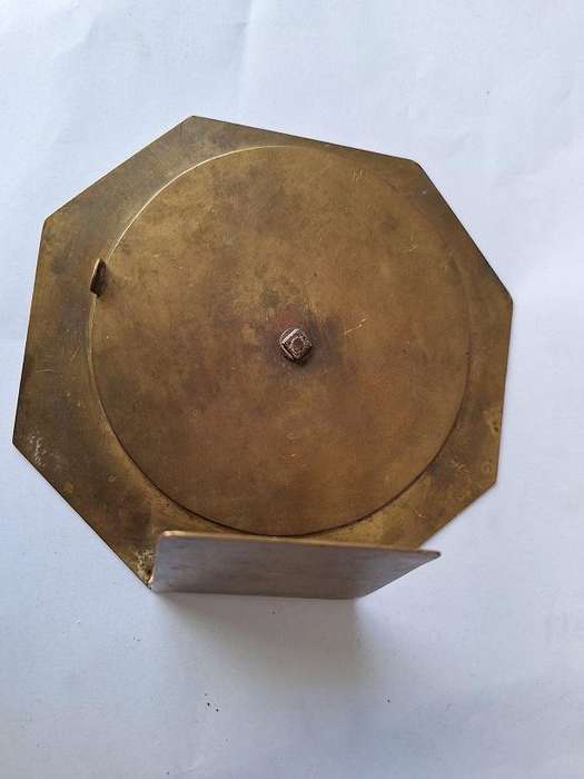 Vintage brass 50 year perpetual calendar, depicting the Voortrekker monument