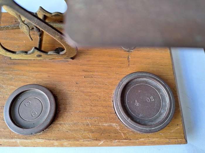 Vintage postal scale with weights