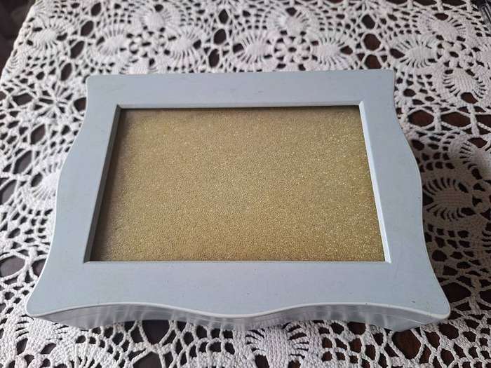 Beautiful light blue musical jewelery box with photo slot top