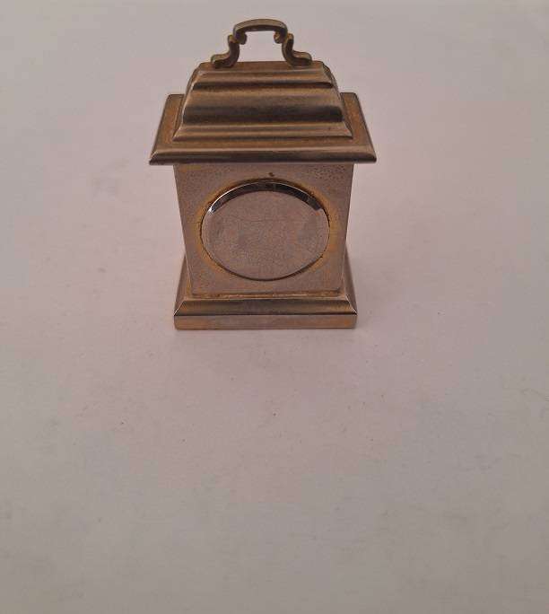 Miniature brass quarts clock, not working 5cm high