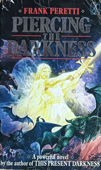 Piercing the Darkness - Frank Peretti- Softcover - 543 pages