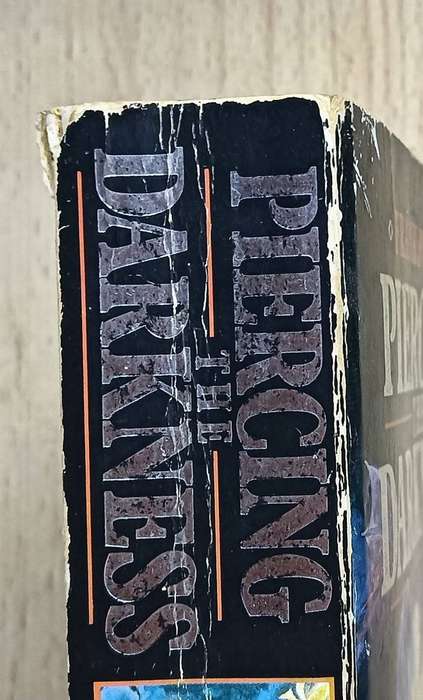 Piercing the Darkness - Frank Peretti- Softcover - 543 pages