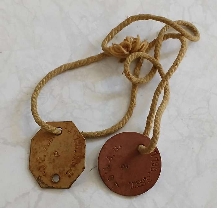 Dog Tags, pair  Issued to: S.Sgt Low