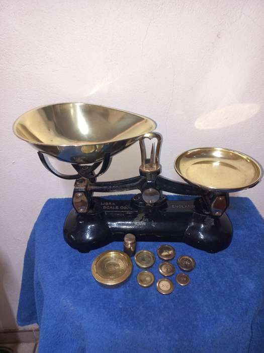 Cast iron and brass libra scale with weights