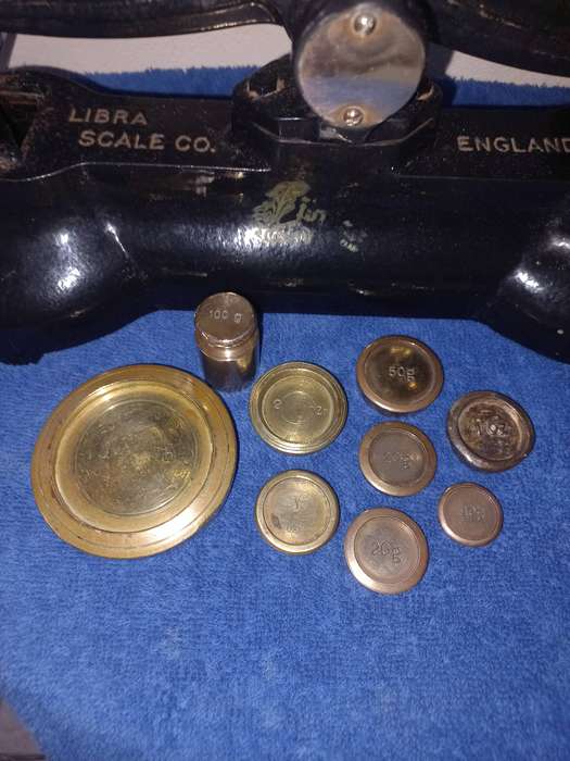 Cast iron and brass libra scale with weights