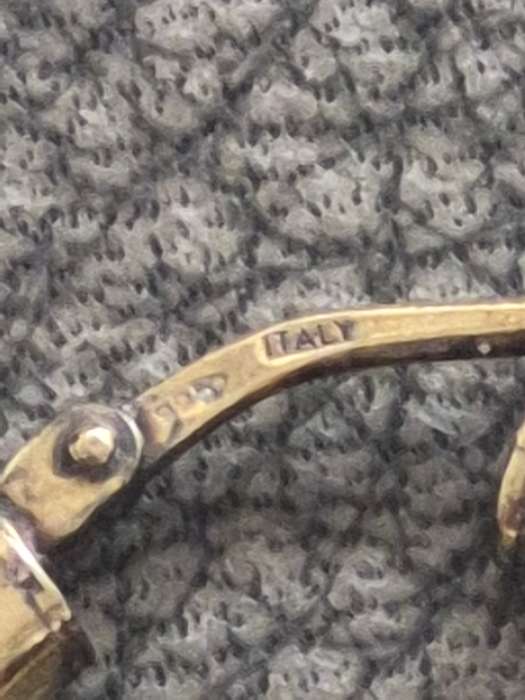 Gold Plated 1.3 gram Sterling Silver  Earring Marked Italy 925. Perfect Condition and Working Order.