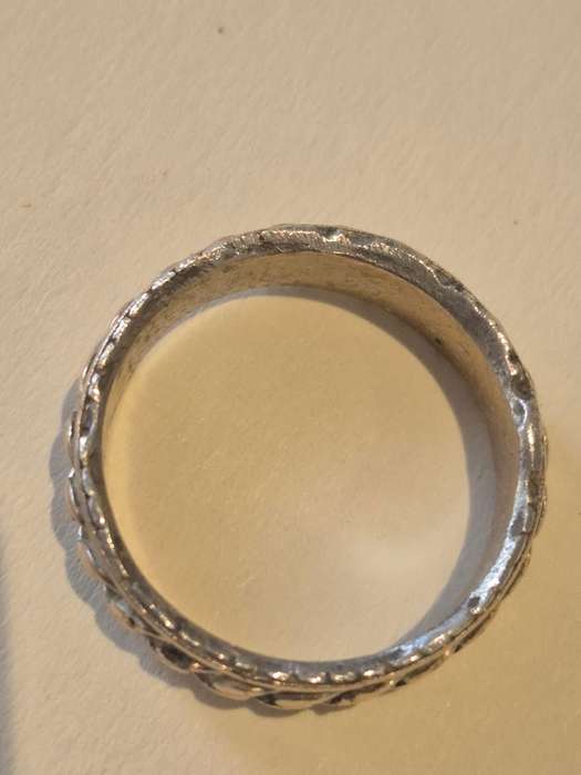 Hand finished chain design smooth irregular edge man ring. Comfort fit.