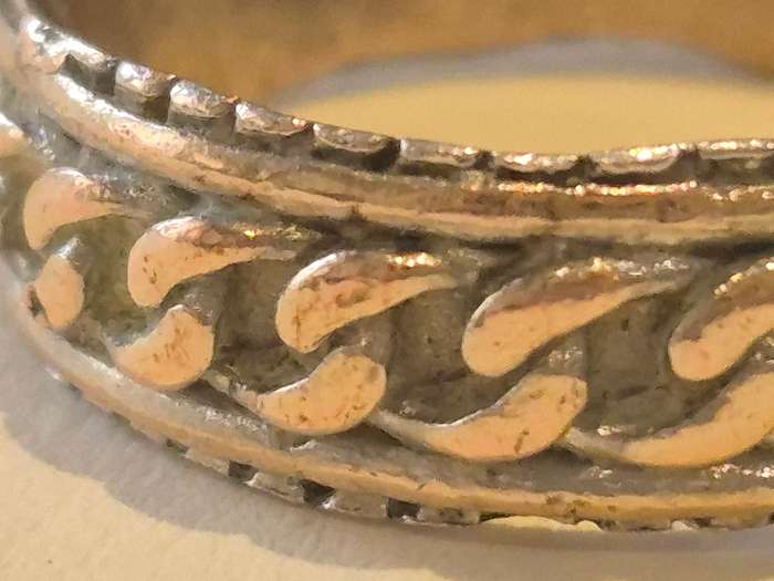 Hand finished chain design smooth irregular edge man ring. Comfort fit.