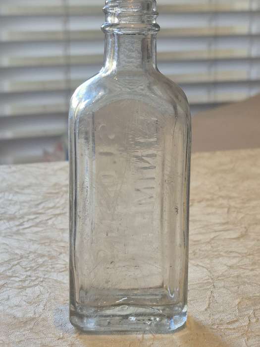 Sloan's Liniment Embossed Bottle. Excellent condition.