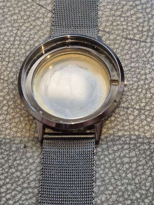 Black All Stainless Steel Mesh Strap, Working, and Black Stainless Steel Watch Case.