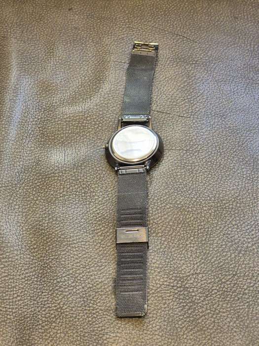 Black All Stainless Steel Mesh Strap, Working, and Black Stainless Steel Watch Case.