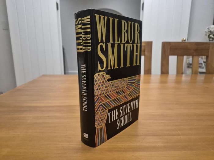 The Seventh Scroll. SIGNED AND INSCRIBED BY WILBUR SMITH TO HIS TRAVEL AGENT FOR HIS EGYPT TRIPS!