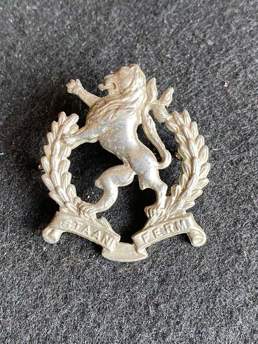 REGT. HIGHVELD CAP BADGE-WHITE METAL- 2 LUGS-POST 1976