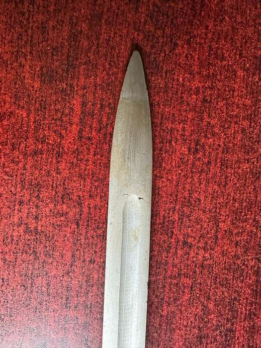 RUSSIAN S.G. SIMONOV DESIGNED THE SKS 45 RIFLE,WHICH INCLUDED A VERY DISTINCTIVE KNIFE BAYONET- THE