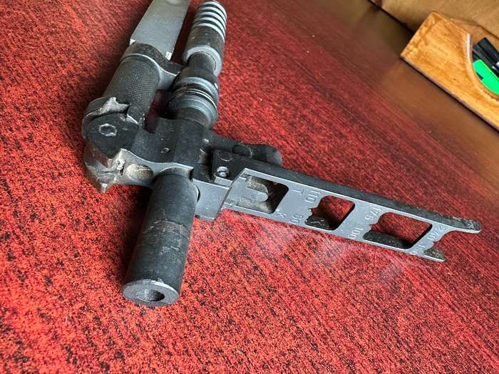 RUSSIAN S.G. SIMONOV DESIGNED THE SKS 45 RIFLE,WHICH INCLUDED A VERY DISTINCTIVE KNIFE BAYONET- THE