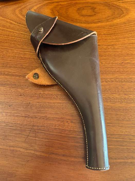 Leather holster for the long barrel Webley revolver. Good condition. RSA and SAP markings.