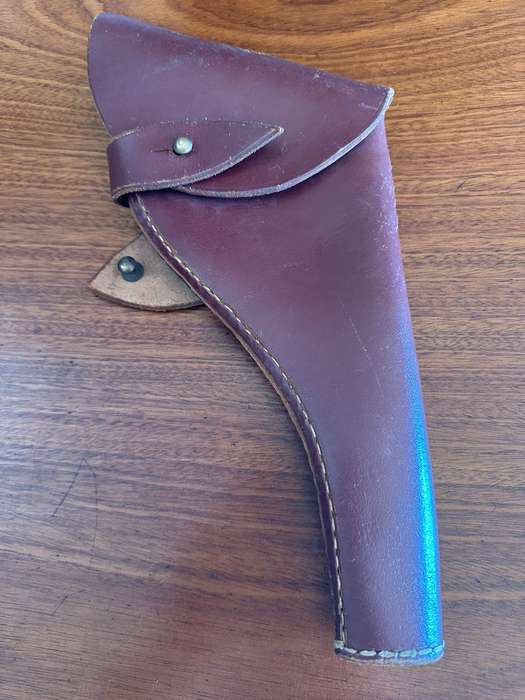 Leather holster for the long barrel Webley revolver. Good condition. No markings.
