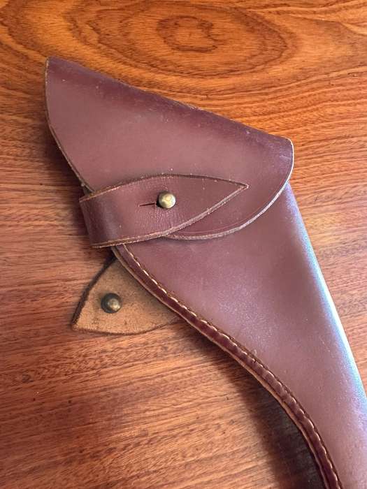 Leather holster for the long barrel Webley revolver. Good condition. No markings.