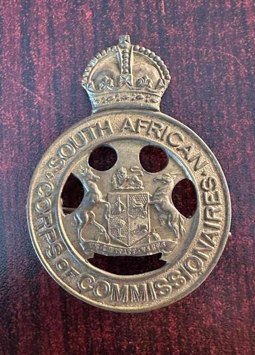 SA Corps of Commissionaires,voided centre. 2 Lugs. Measures 60 mm.