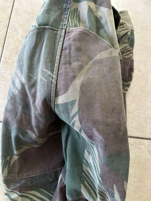 Rhodesian camo trousers. Reinforced back side. Please look at pictures for size. 3 Buttons missing.
