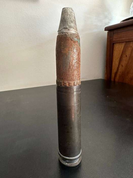 30 mm. Round. Deactivated. Height 20 cm.