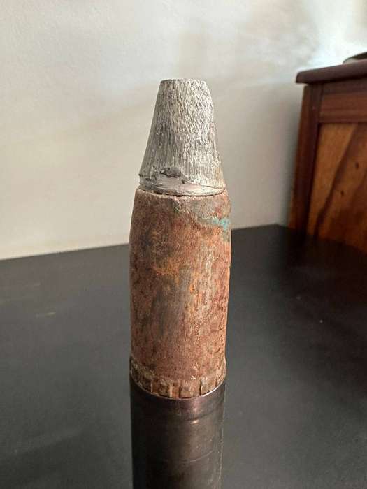 30 mm. Round. Deactivated. Height 20 cm.